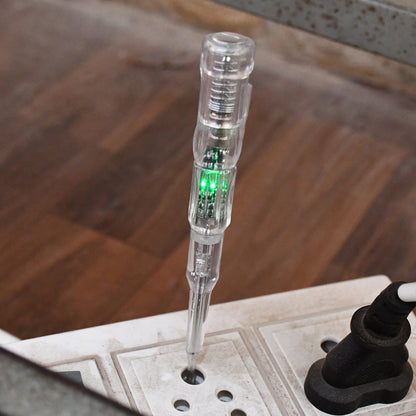 Wukusy electrical detector slotted screwdriver with small batteries, ideal for home improvement tasks, shown with its battery compartment.