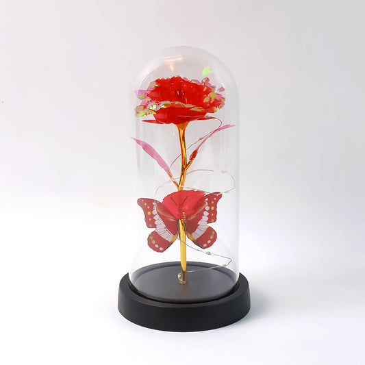 Elegant LED eternal rose in clear plastic dome by Wukusy, battery not included, perfect for home decor.