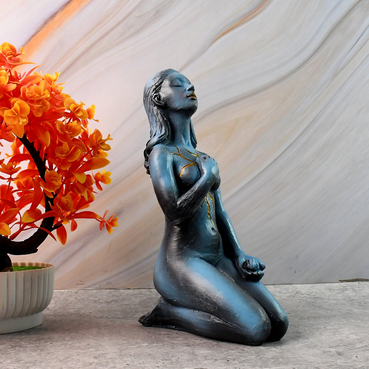 Elegant resin kneeling woman decorative statue by Wukusy, perfect for home decor and enhancement.