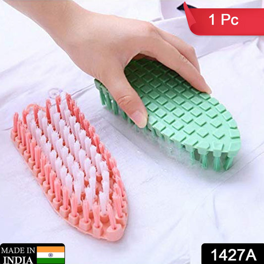 Flexible plastic cleaning brush by Wukusy for kitchen and bathroom cleaning, ideal for scrubbing surfaces and hard-to-reach areas.