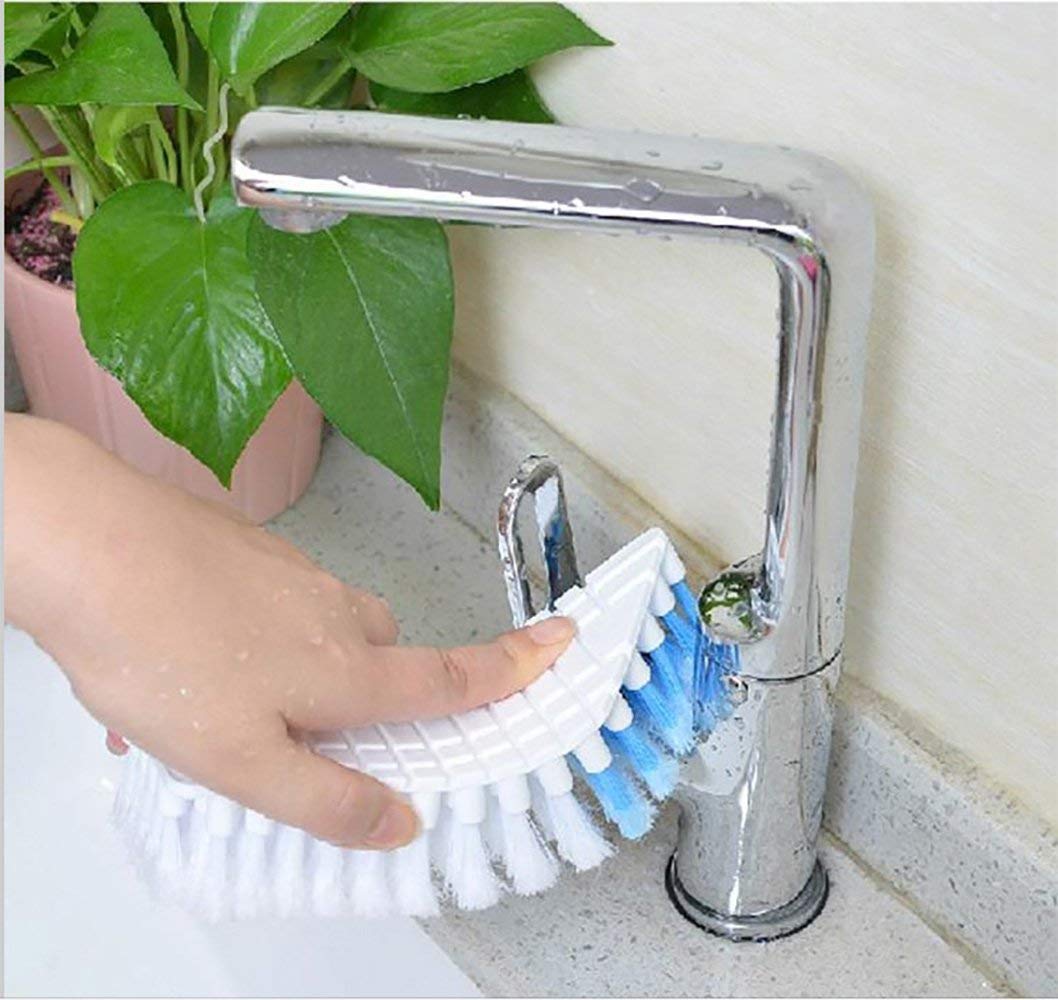 Flexible plastic cleaning brush from Wukusy for kitchen and bathroom cleaning, with ergonomic handle and durable bristles.