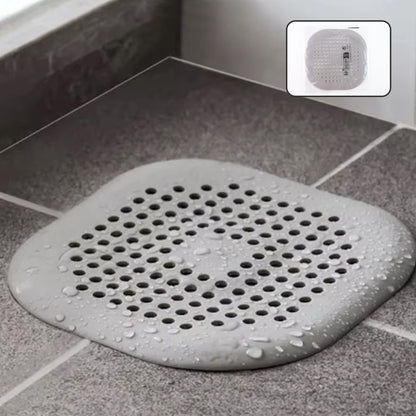 Flexible silicone drain cover strainer by Wukusy, ideal for preventing clogs in kitchen or bathroom drains.