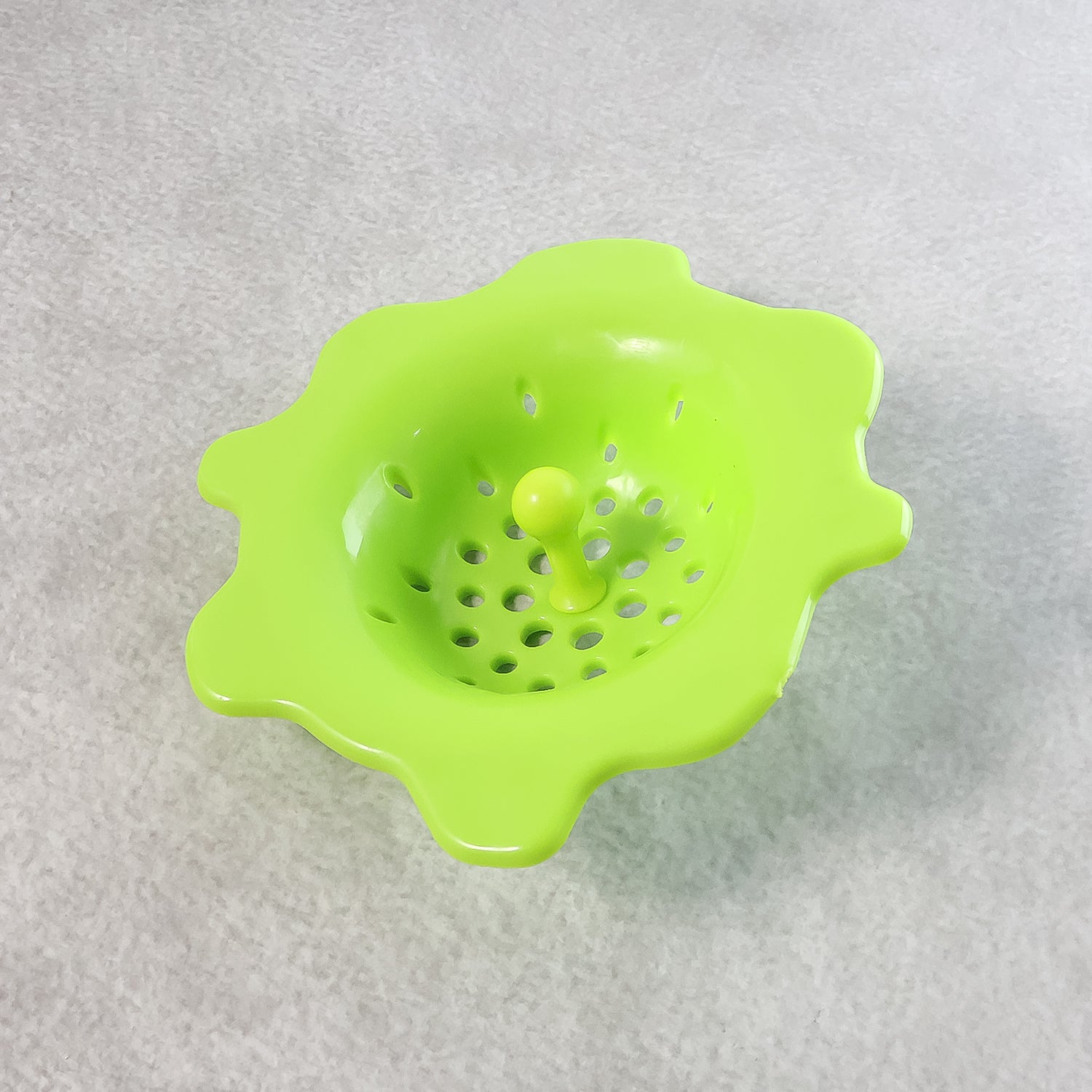 Flexible silicone sink strainer and hair catcher by Wukusy, designed to fit drains and prevent clogs with easy-to-clean material.