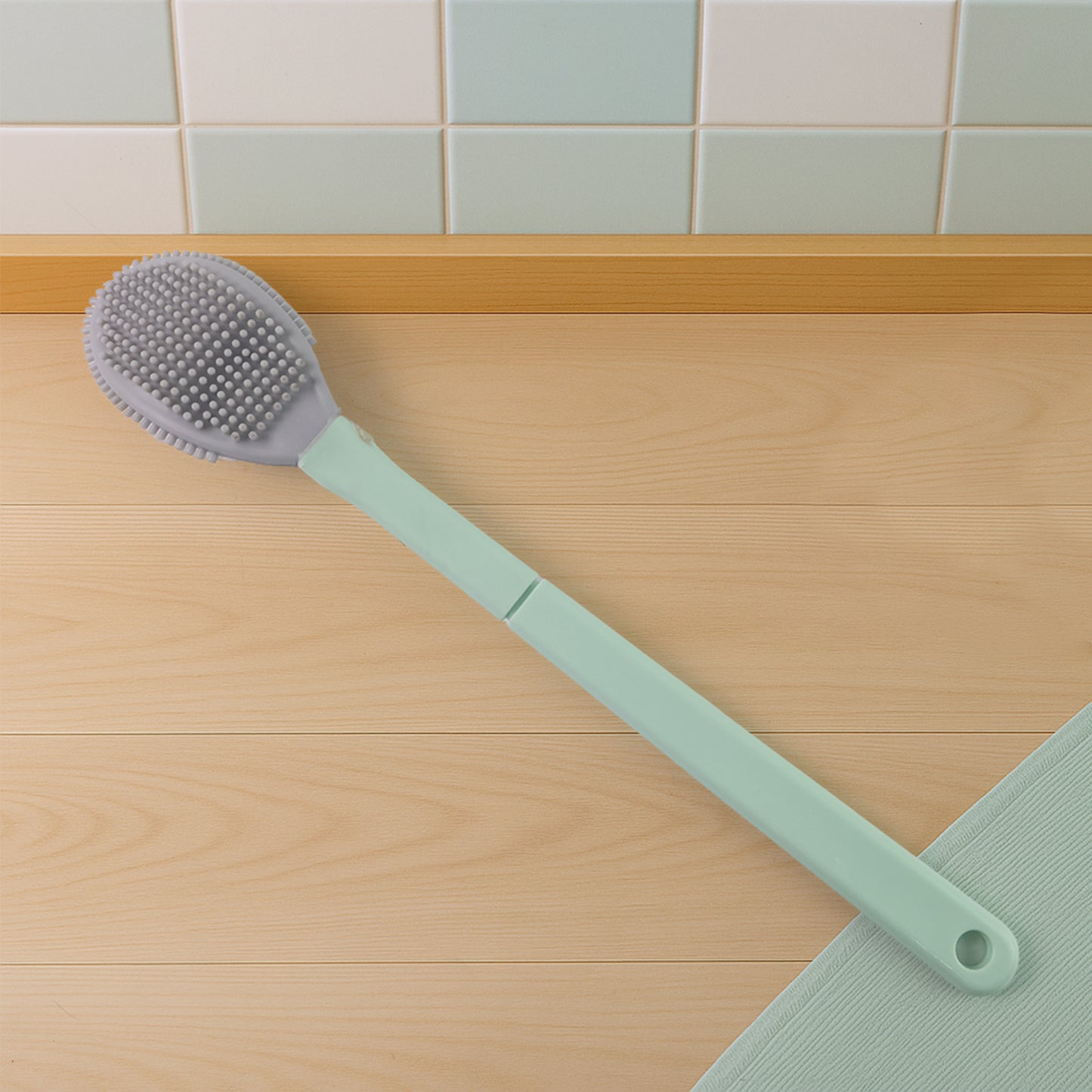 Flexible silicone toilet cleaning brush set by Wukusy with ergonomic handles and soft bristles for easy bathroom cleaning.