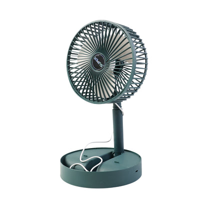 Wukusy foldable mini desk fan with adjustable height and tilt, compact home improvement cooling device on a desk.
