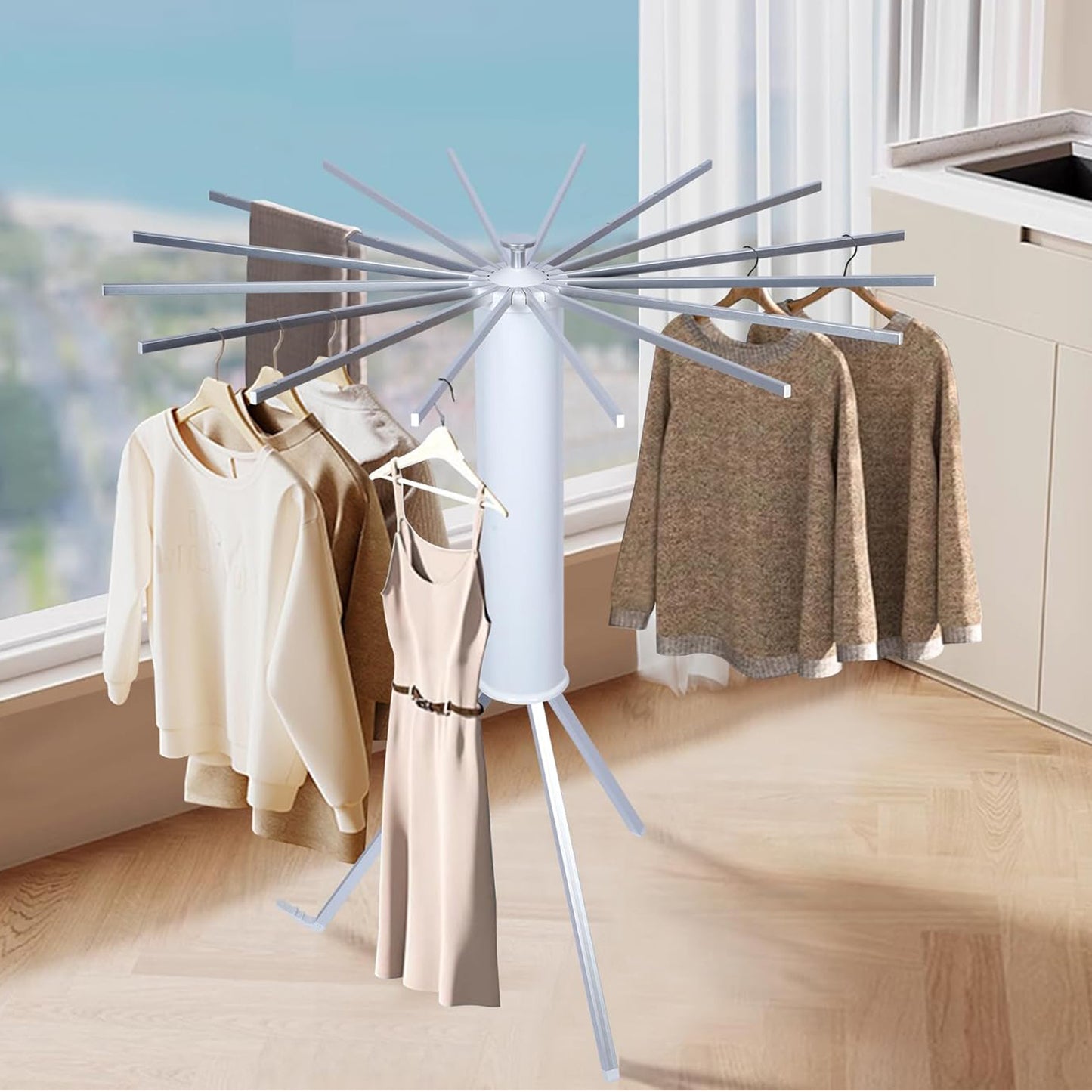 Wukusy foldable rotary clothes drying rack stand for home use, with multiple drying arms and a sturdy frame.
