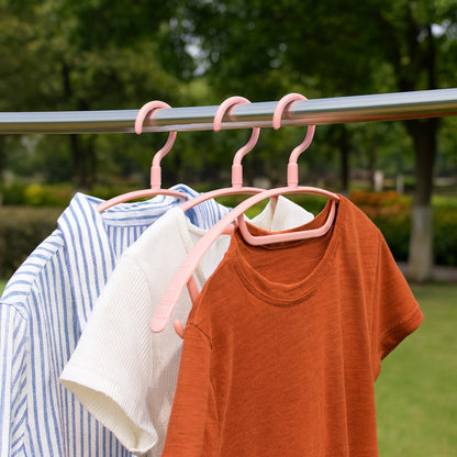 Set of six durable plastic cloth hangers by Wukusy, ideal for organizing clothing in home improvement spaces.