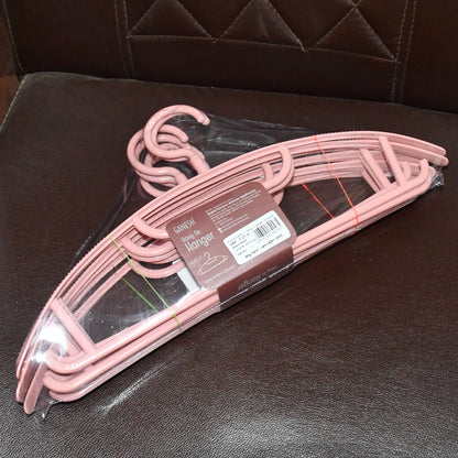 Set of 6 durable plastic cloth hangers featuring Ganesh design, ideal for organizing clothes in home improvement projects.