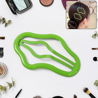 Multicolor Wukusy hair clips for women, small hair accessories for styling or securing hair, shown in a close-up image.