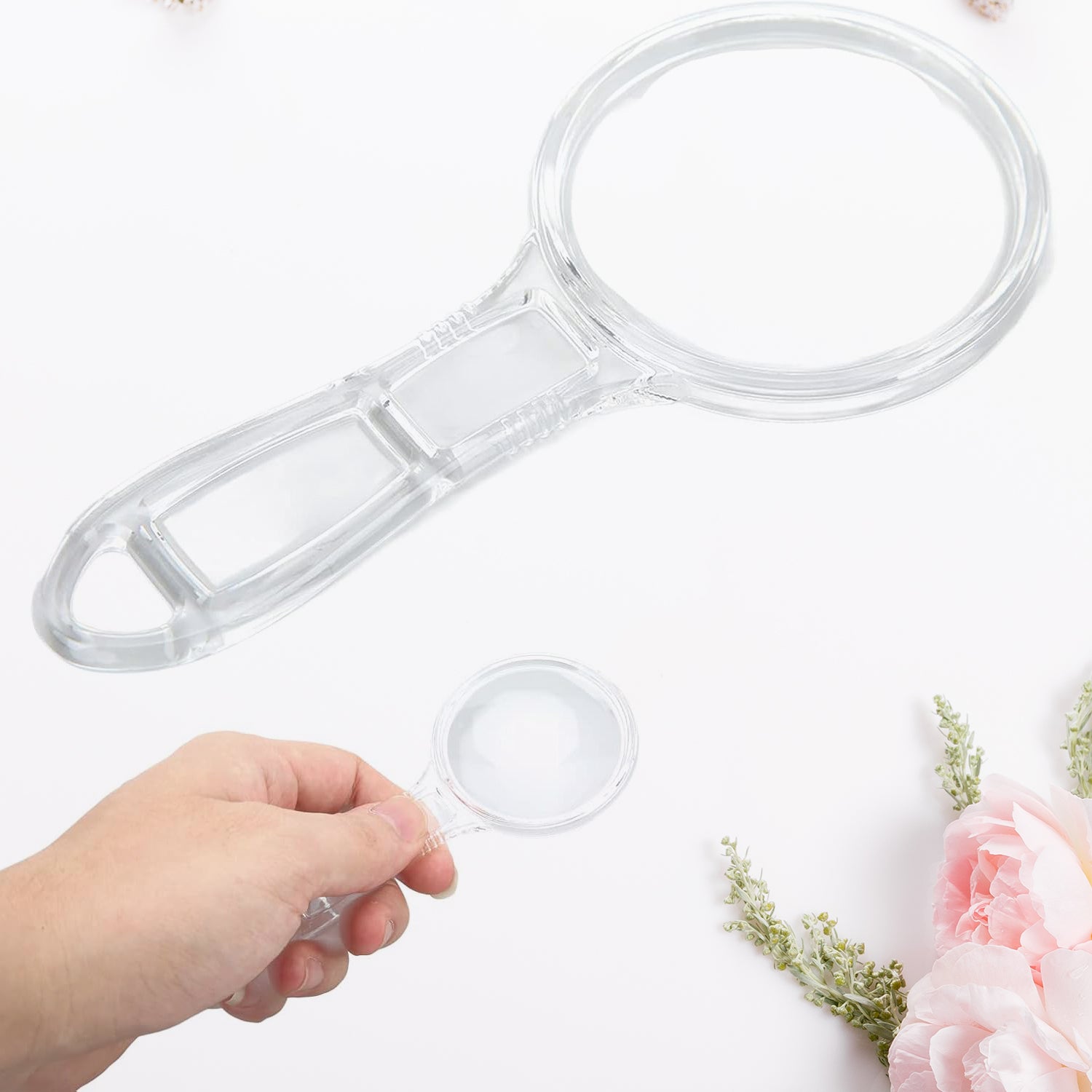 Wukusy handheld plastic magnifying glass, 55mm lens, used for home improvement tasks, with a clear view of the lens and handle.