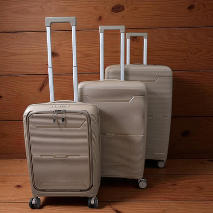 Set of three Wukusy hard-shell trolley luggage bags in mixed colors, showing sturdy design and rolling wheels for travel.