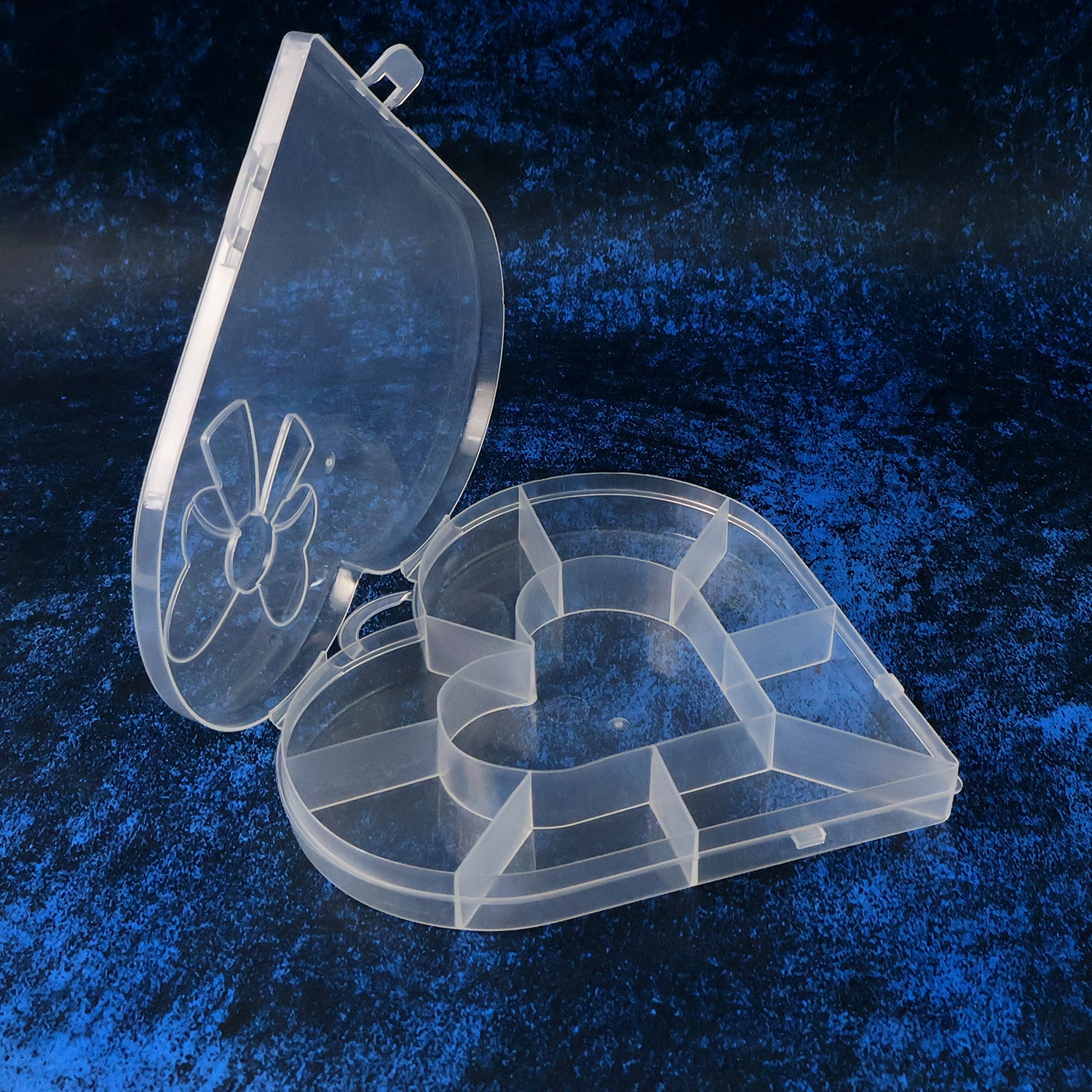Heart-shaped plastic bead storage organizer box by Wukusy, ideal for organizing small craft supplies and jewelry components.