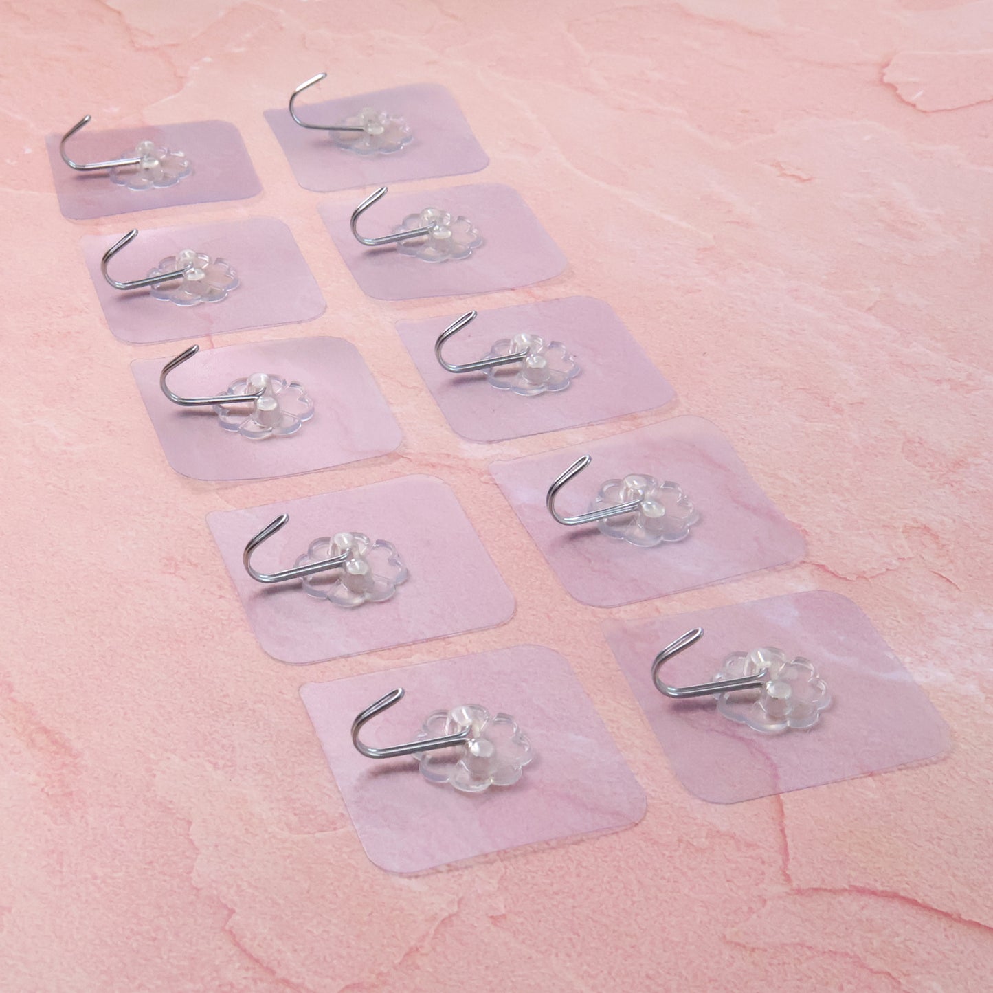 Set of 10 Wukusy heavy-duty flower adhesive wall hooks for home improvement, suitable for hanging lightweight items indoors.