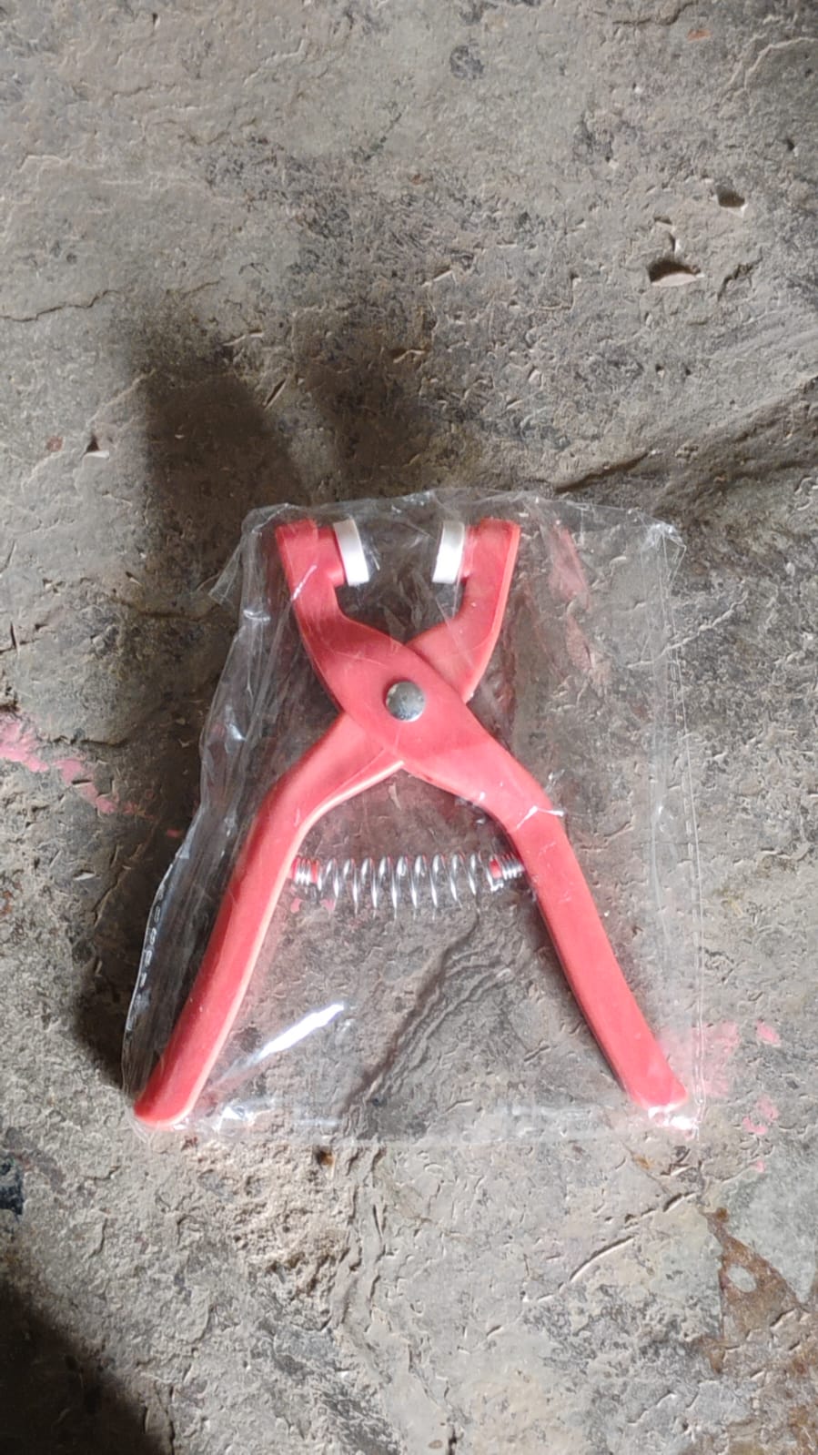 Wukusy hole pliers eyelet installation tool for clothing sewing, used to attach eyelets and buckles to fabric.