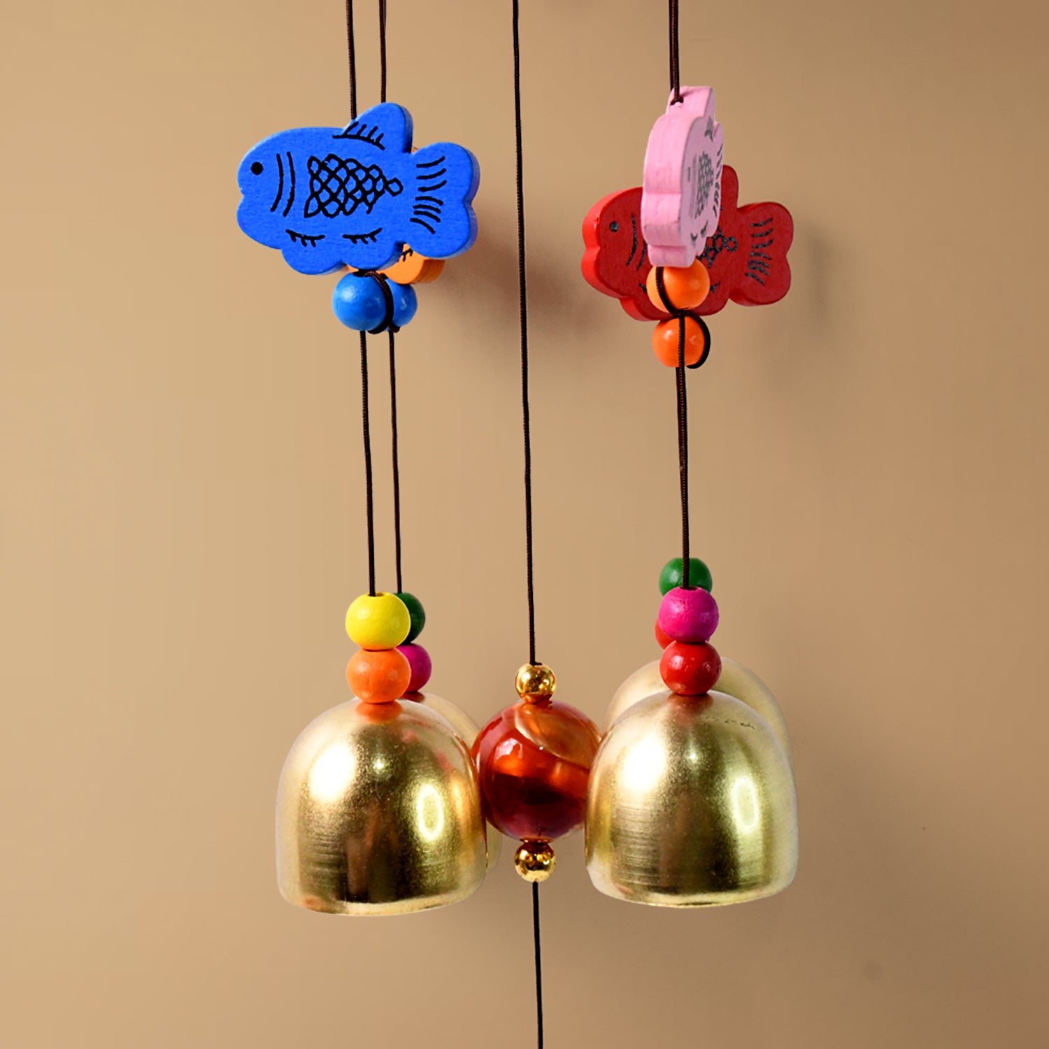 Wukusy outdoor hanging wind chimes for home decor, featuring metal tubes and decorative design for patio or garden display.