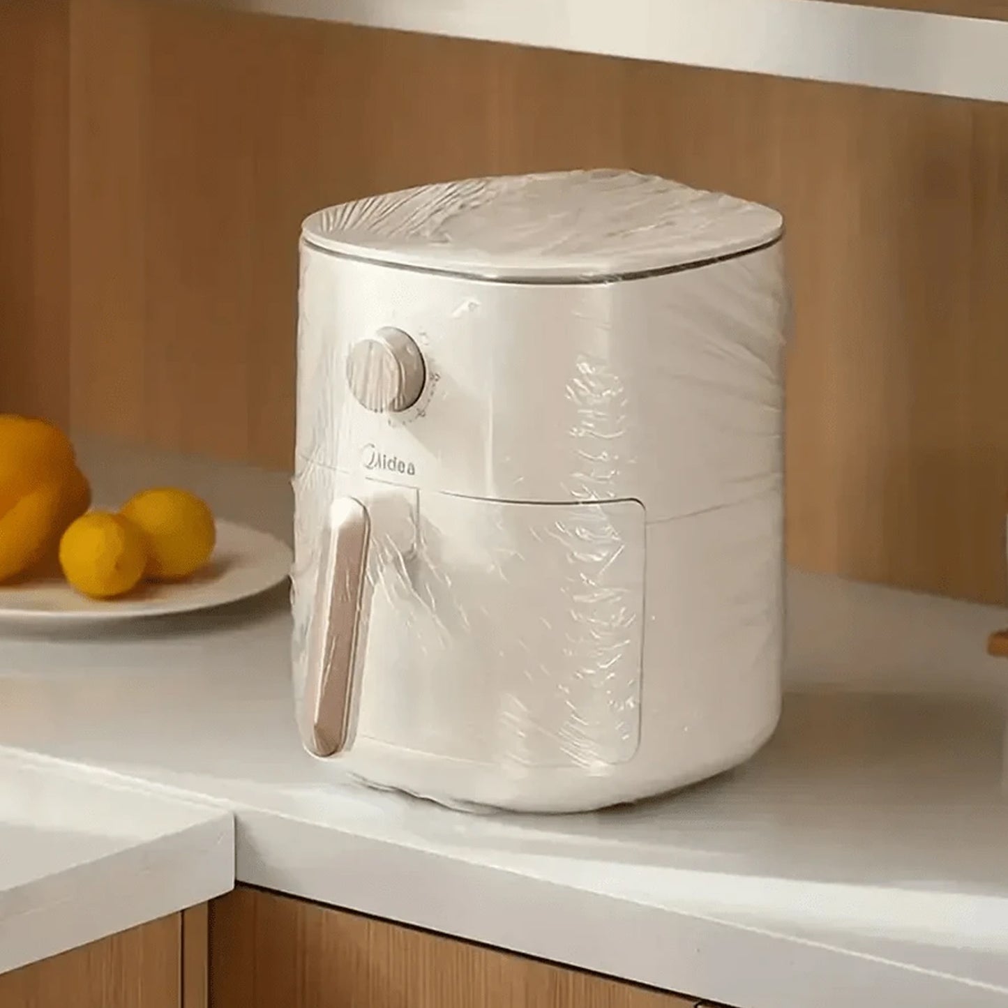Wukusy home thick disposable dust-proof plastic furniture cover for small furniture, ideal for home improvement protection.
