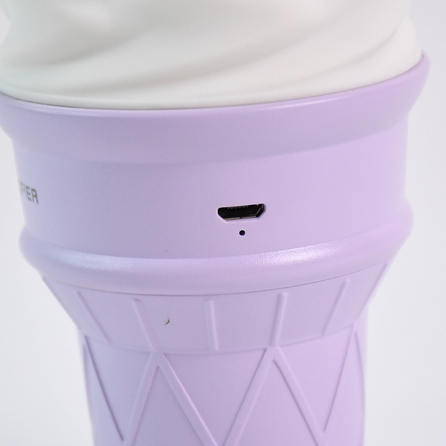 Purple ice cream cone-shaped air freshener humidifier by Wukusy, designed for home improvement and air scenting.
