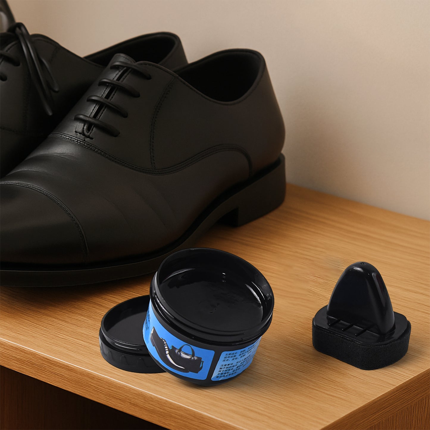 Wukusy instant shoe shine sponge with liquid polish in a compact package, perfect for quick home shoe maintenance.