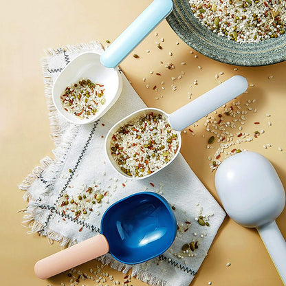Large plastic measuring spoon for flour from Wukusy, ideal for home kitchen baking and cooking, durable and easy to use.