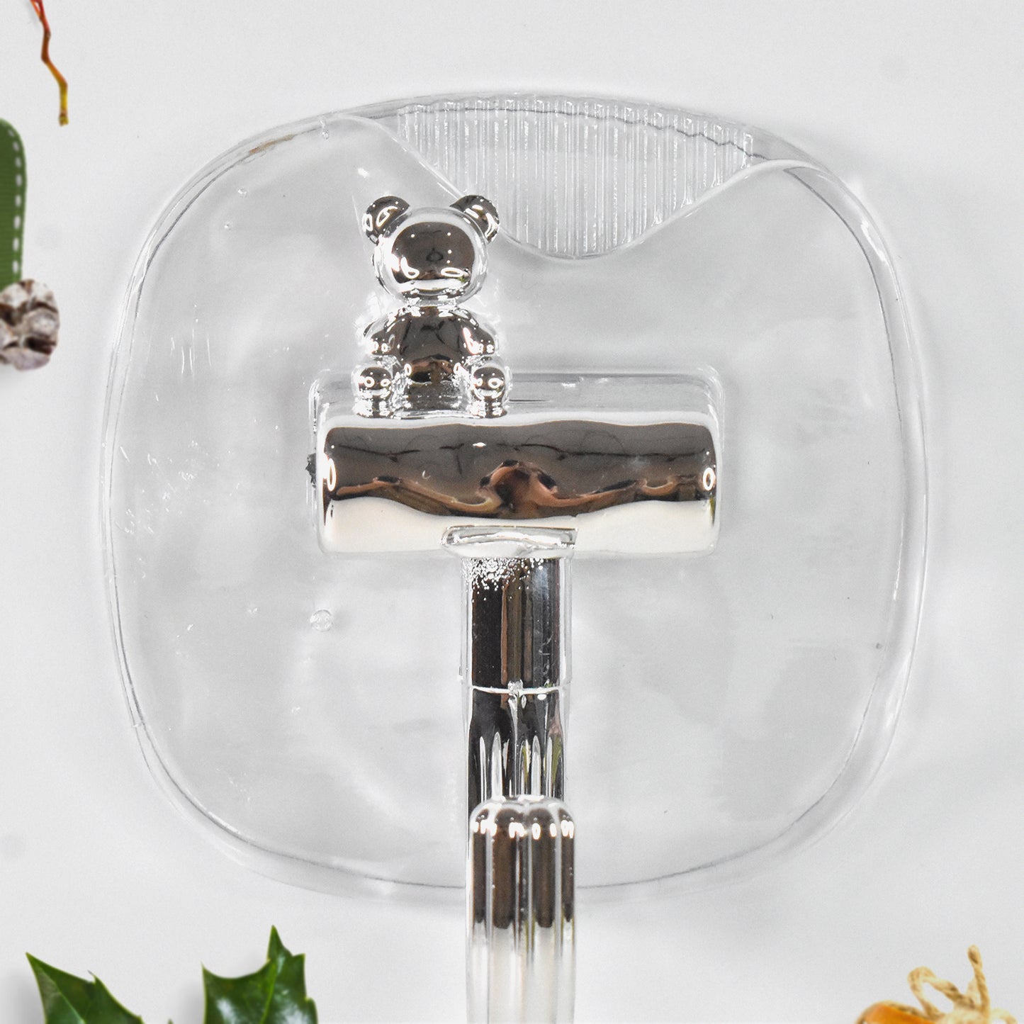 Two large plastic self-adhesive wall hooks by Wukusy for home improvement, mounted on a wall for hanging items.