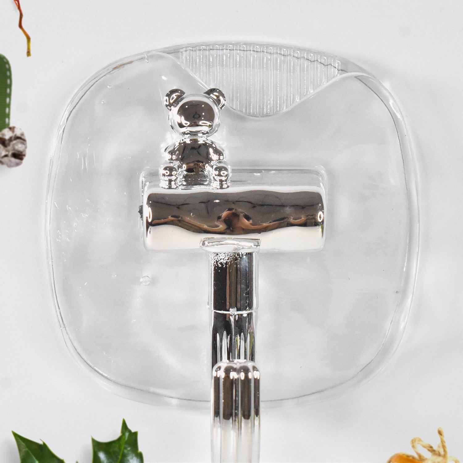 Two large plastic self-adhesive wall hooks by Wukusy for home improvement, mounted on a wall for hanging items.