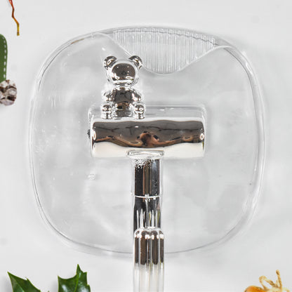 Two large plastic self-adhesive wall hooks by Wukusy for home improvement, mounted on a wall for hanging items.