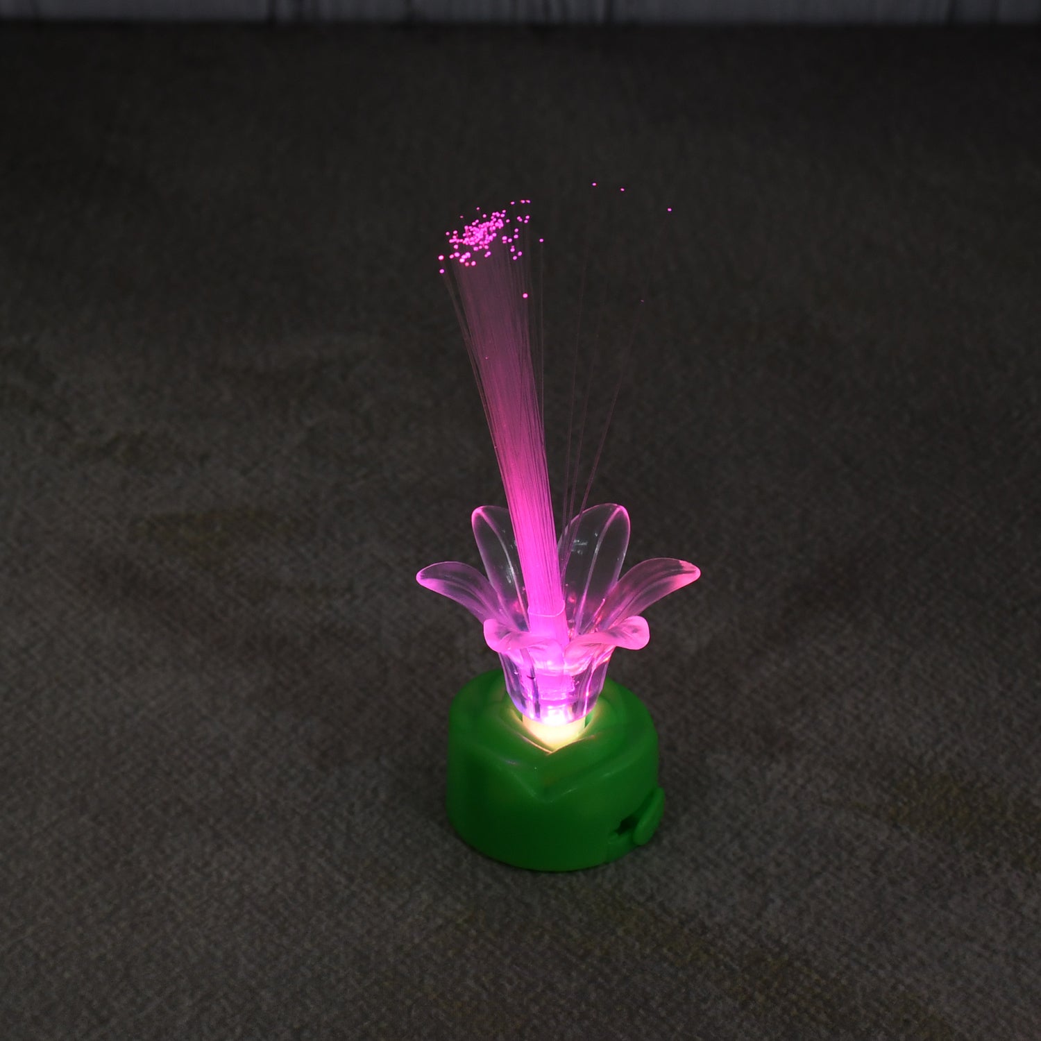 Wukusy LED Candlelight with multicolor glow, decorative candle-shaped LED light for home improvement and ambiance.