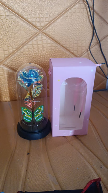 Wukusy LED-powered eternal rose in clear plastic dome, decorative floral home improvement piece, battery not included.