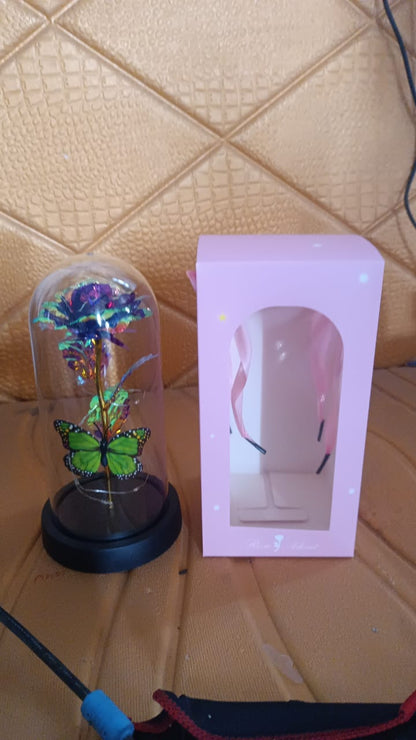 Wukusy LED preserved rose with a colorful butterfly inside a clear plastic dome, decorative home improvement flower display.