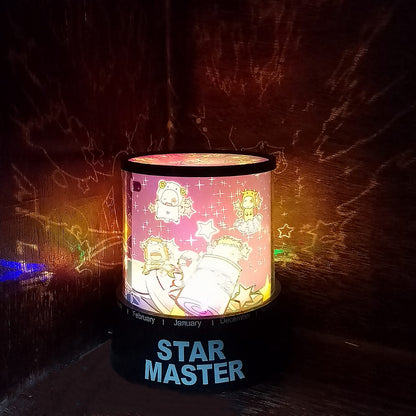 Wukusy LED projector night light lamp with rotating feature, music function, battery operated for kids' bedroom and home decor.