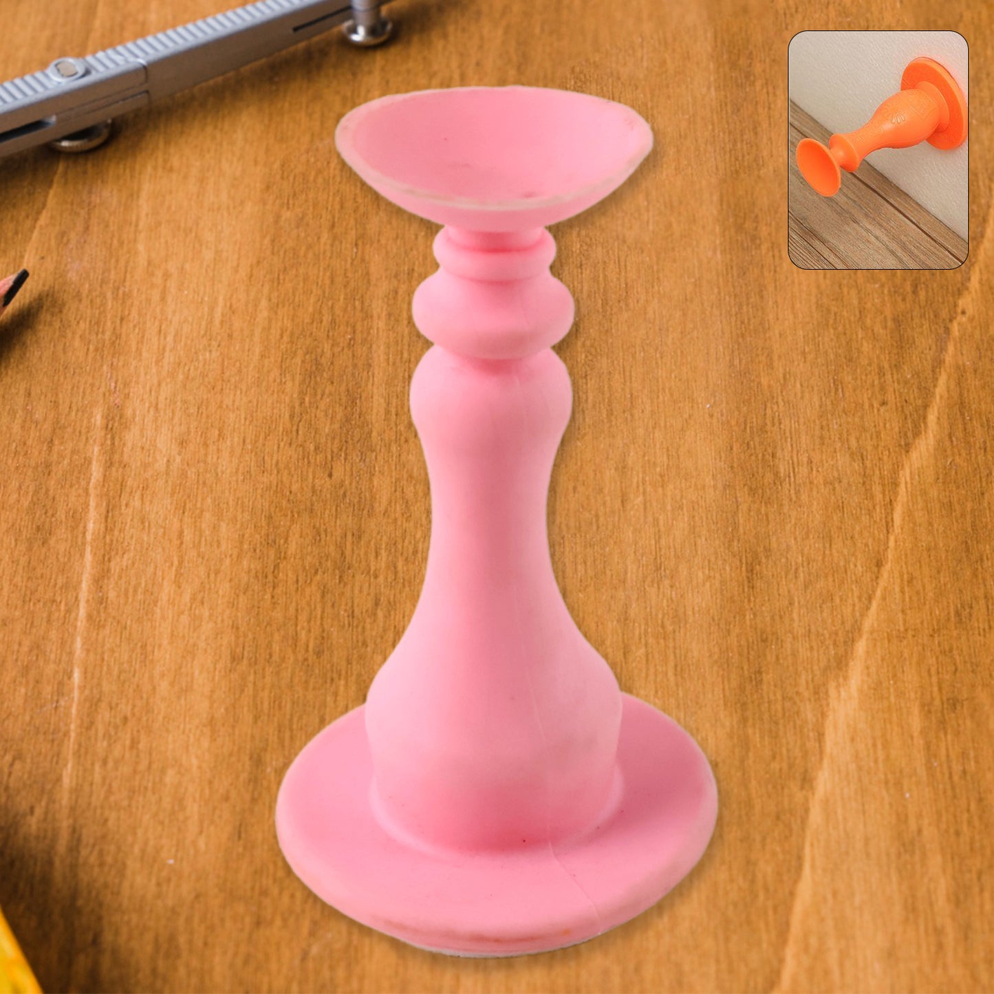 Light pink washing machine door holder and stopper by Wukusy, designed to keep washing machine doors open securely.