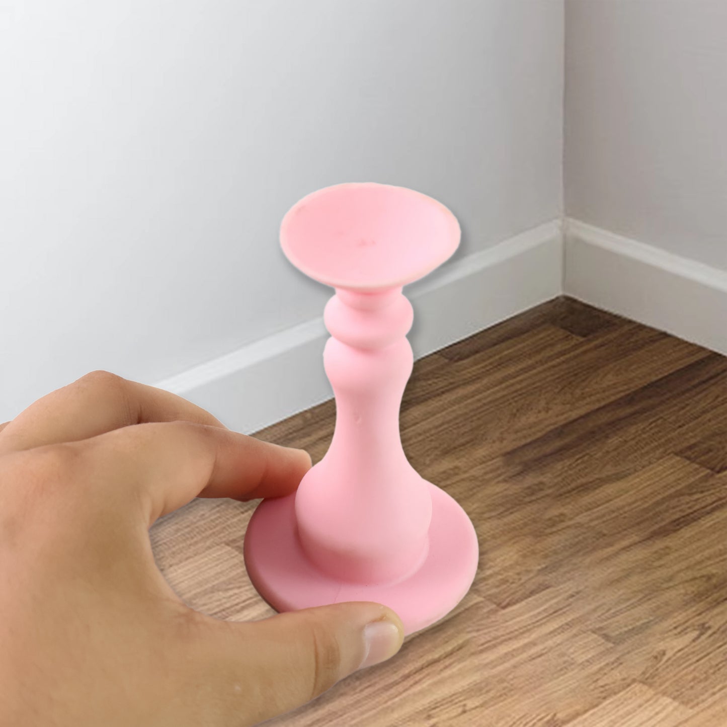 Light pink Wukusy washing machine door holder and stopper, designed to keep washing machine doors open or closed securely.