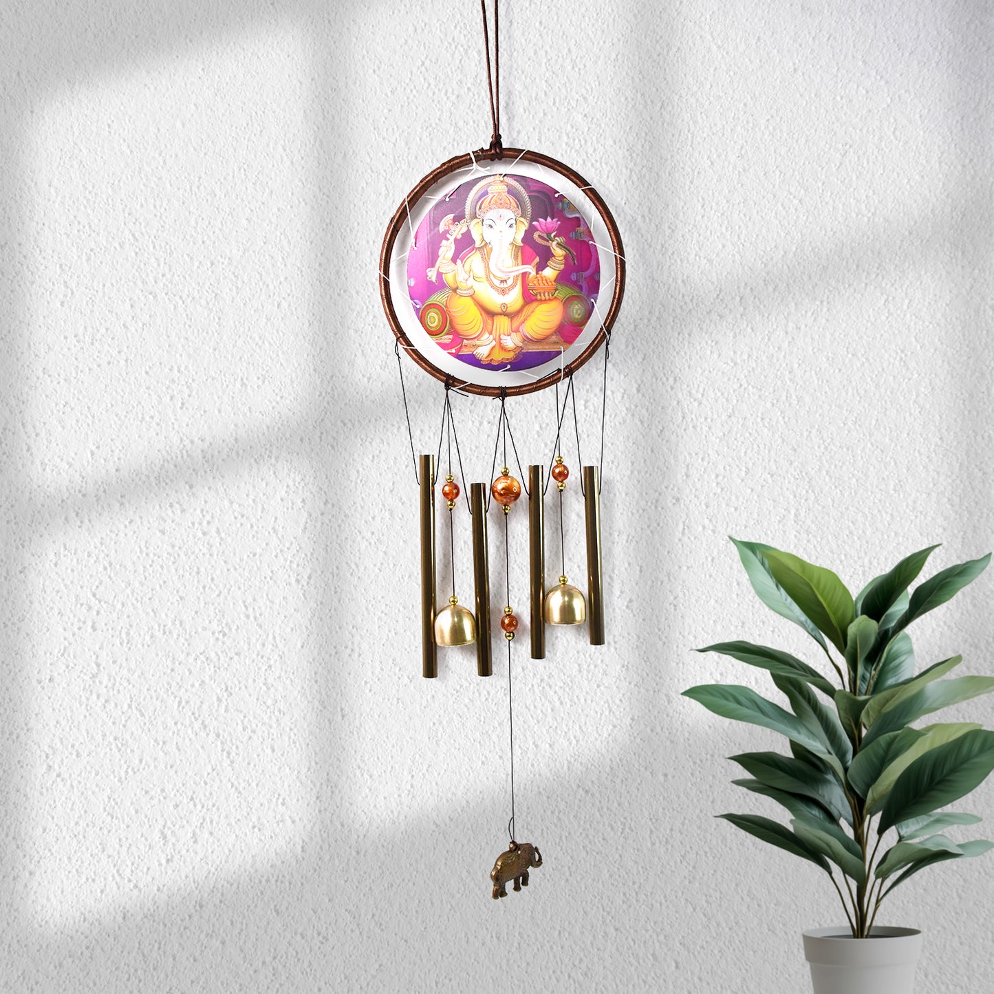 Wukusy Lord Ganesh outdoor hanging wind chimes made of metal with intricate Ganesh figure, designed for home decoration and outdoor use