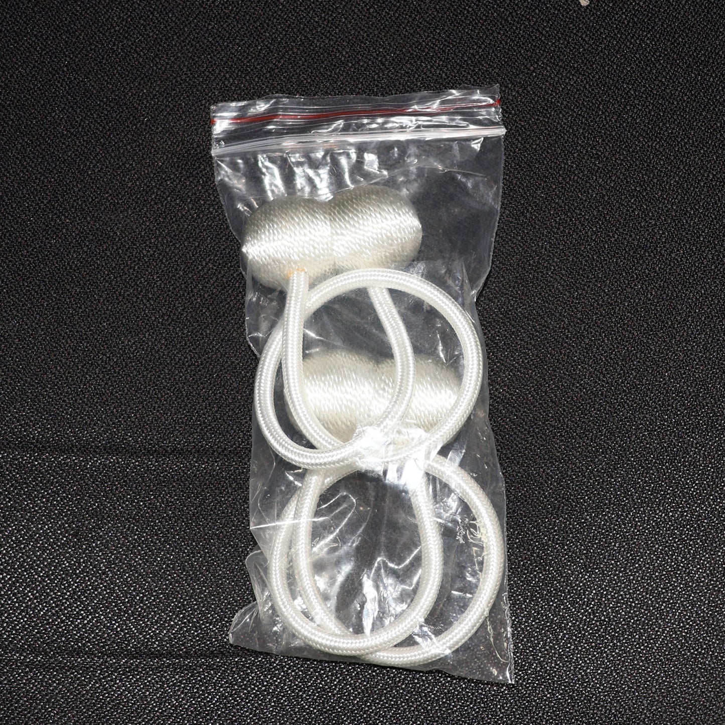 Wukusy magnetic curtain tiebacks set of two used to hold back curtains in home improvement projects.
