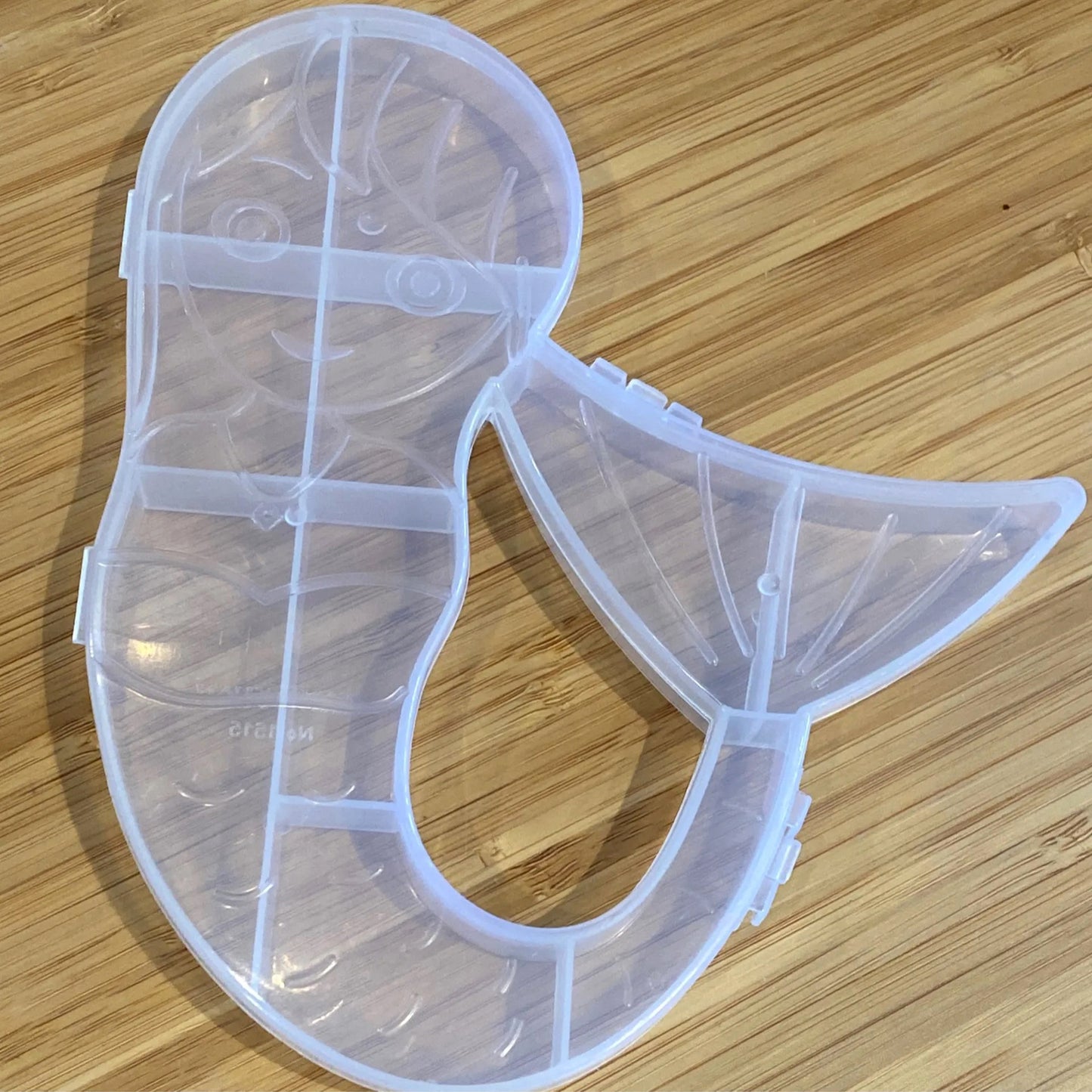 Mermaid-shaped plastic storage organizer box by Wukusy, ideal for home improvement and organizing small items.