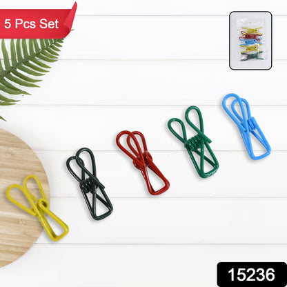 Set of five metal clothes pins clips by Wukusy, ideal for hanging laundry or home improvement tasks.