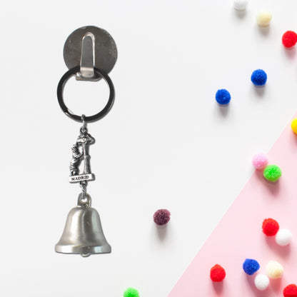 Wukusy metal small temple bell keychain with vibrant mixed colors, suitable for motorcycle or home improvement accessories.