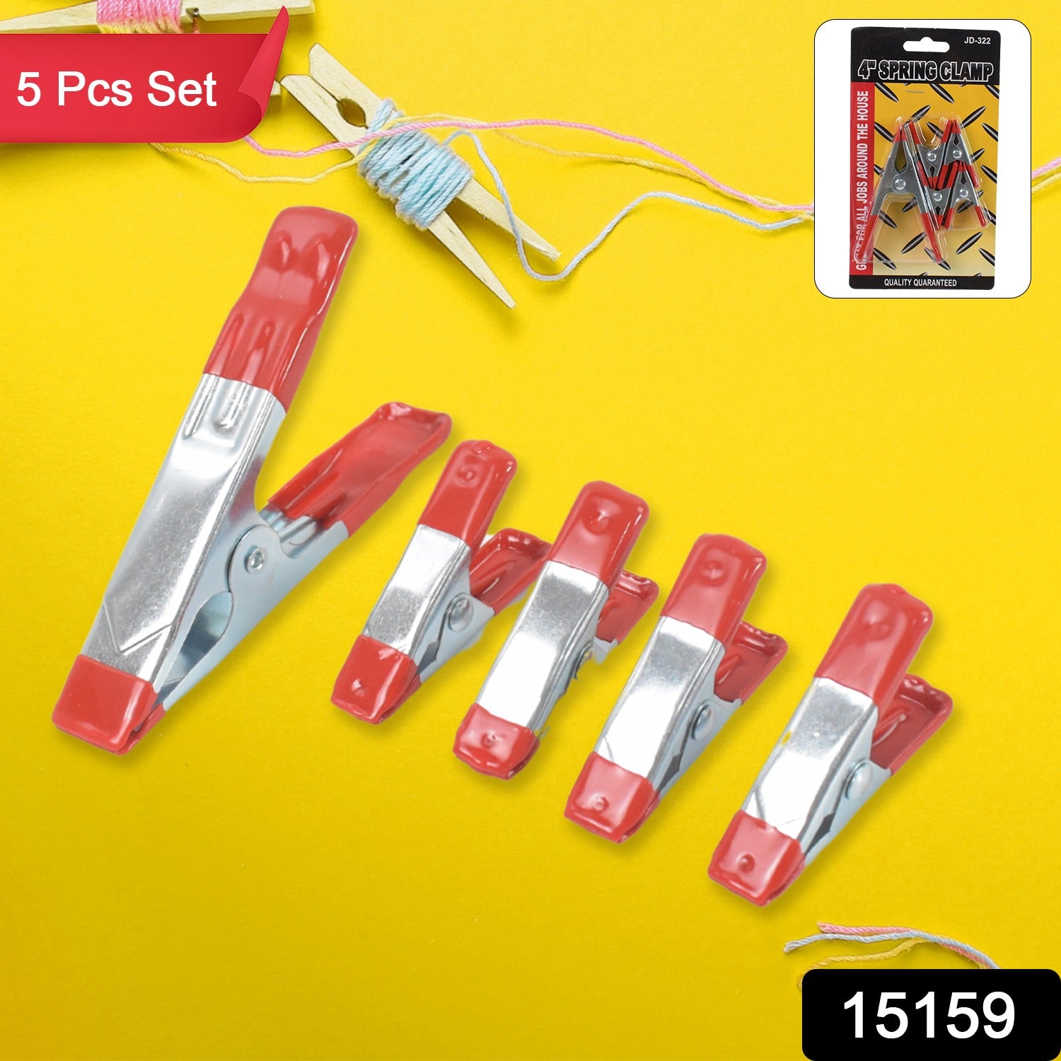 Set of 5 heavy-duty metal spring clamps by Wukusy, ideal for home improvement projects, showing the clamps in a ready position.