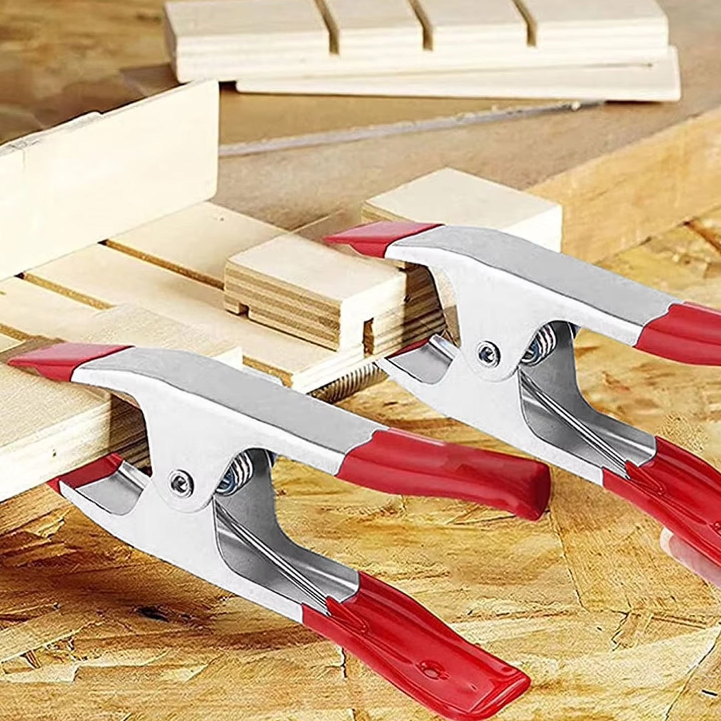 Set of 5 heavy-duty Wukusy metal spring clamps, versatile spring clips for home improvement projects and fastening tasks.