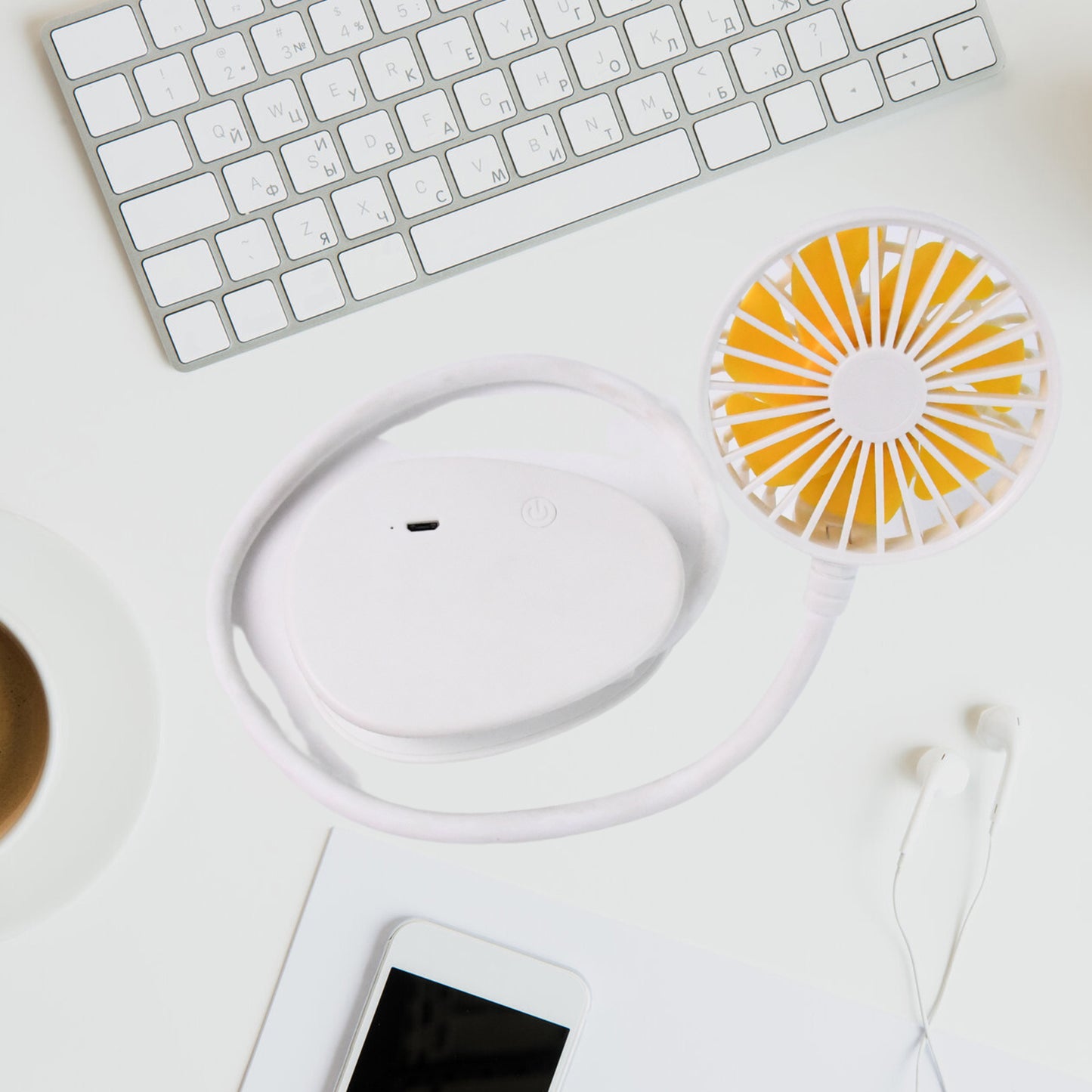 Wukusy Mini USB Fan, compact portable cooling device for home improvement, showing a small black fan with USB connection.