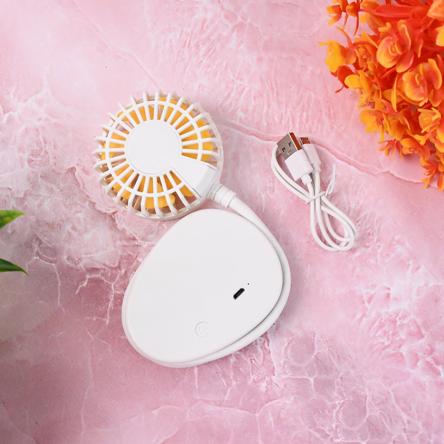 Wukusy mini USB fan, compact portable cooling device for home improvement, shown with blades and USB connector.