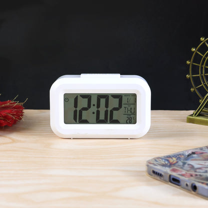 Wukusy modern digital LED alarm mini clock for home, displaying time with bright LED digits on a sleek compact design.