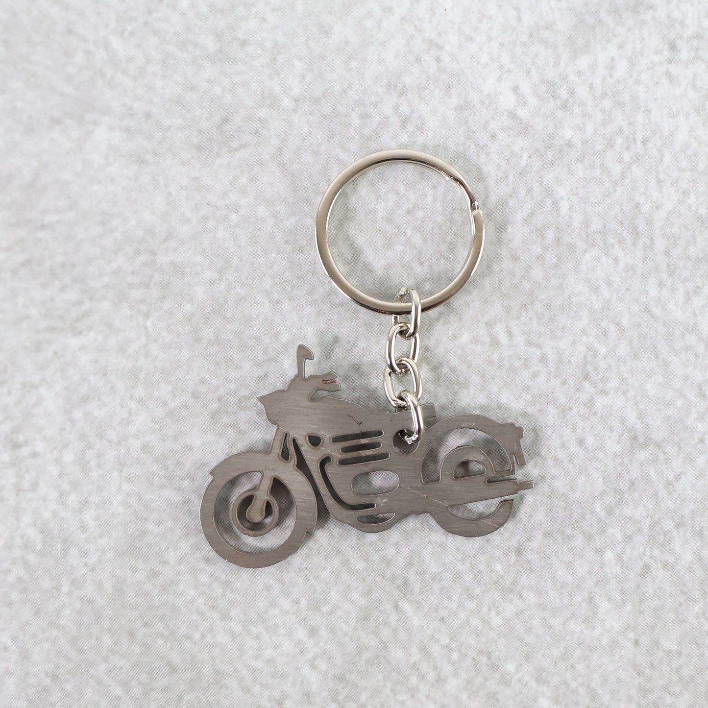 Wukusy motorcycle silhouette metal keychain, durable home improvement accessory with a sleek motorcycle design.