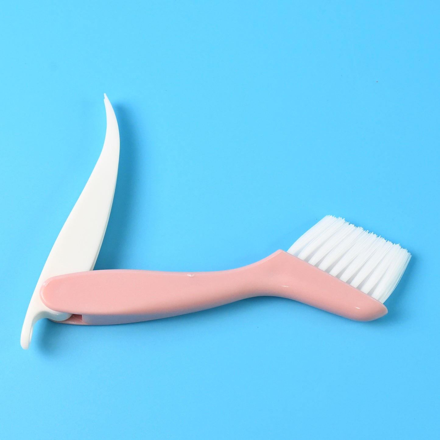 Wukusy 2-in-1 Groove Cleaning Brush with Crevice Scraper for home improvement, featuring dual-sided design for versatile cleaning tasks.