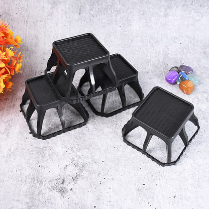 Set of four Wukusy plastic washing machine stands for home improvement, providing stable support for laundry machines.