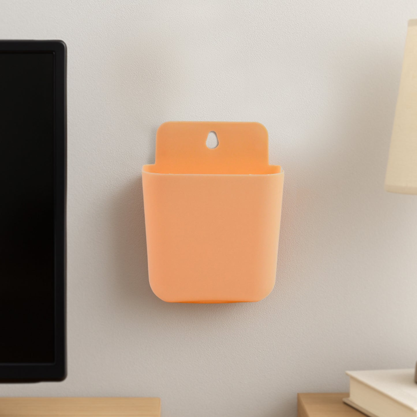 Wall-mounted plastic storage pocket by Wukusy, multi-purpose home improvement organizer for walls, ideal for organizing small items.