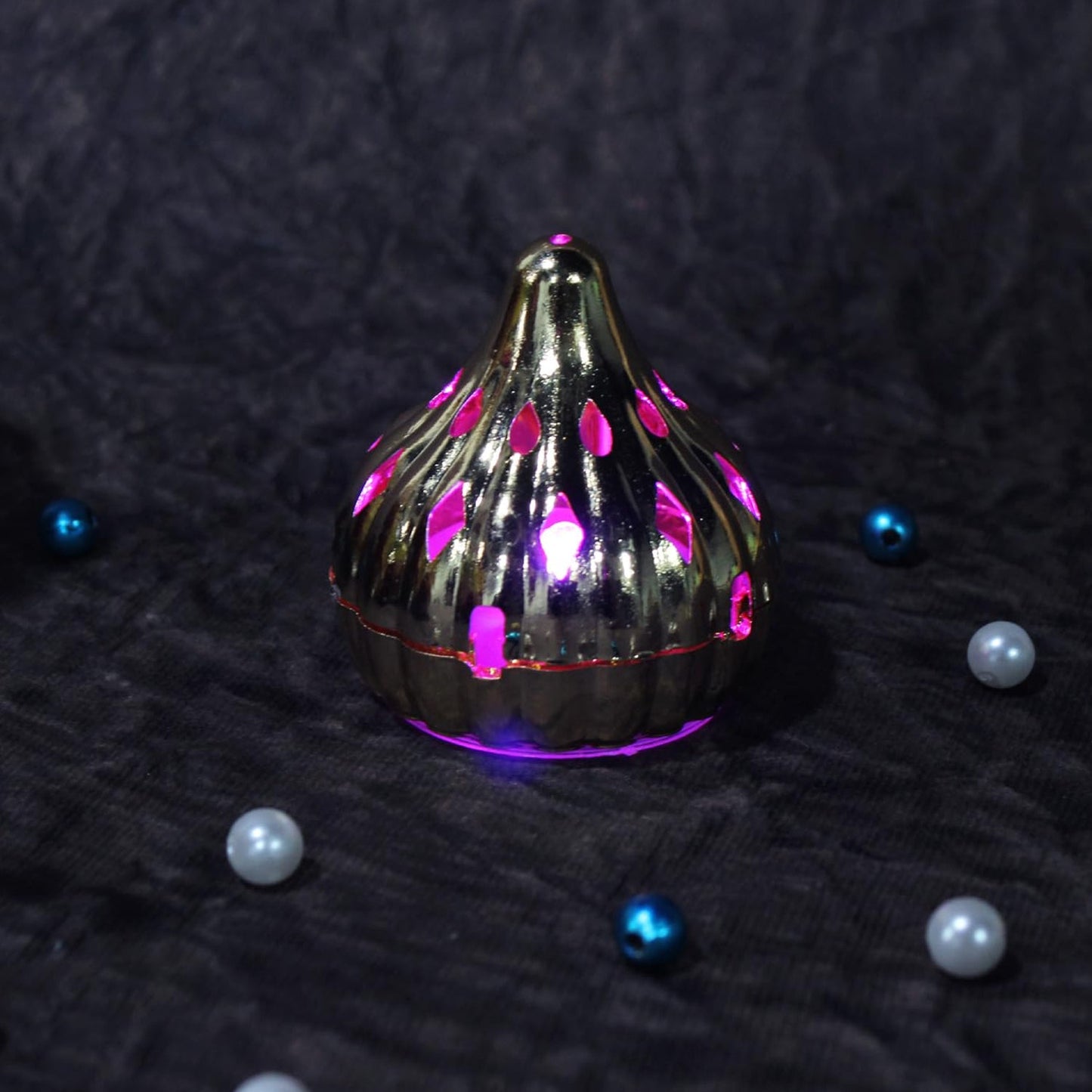 Multicolor modak-shaped color-changing LED light by Wukusy, ideal for home decor and ambient lighting.