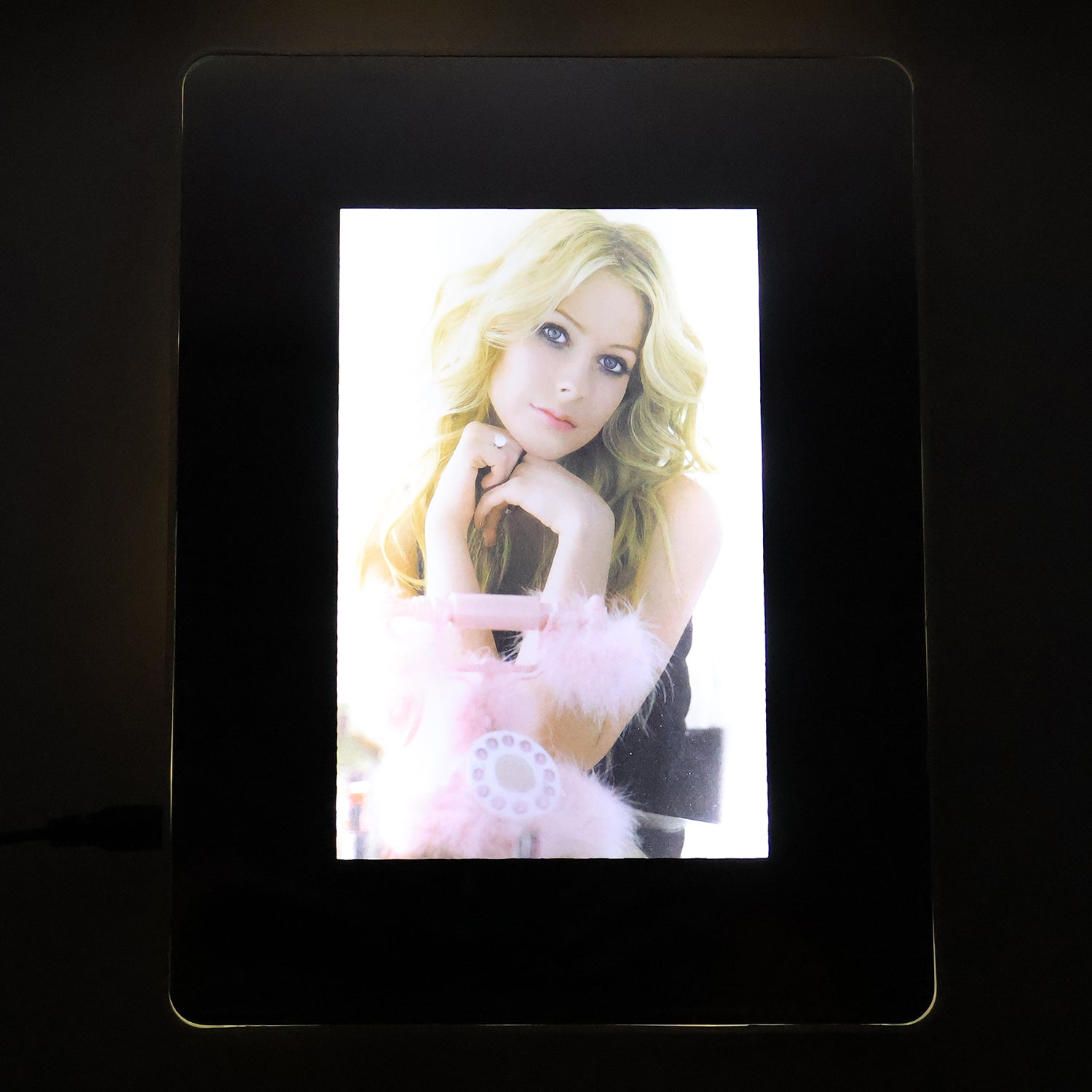 Wukusy multifunctional LED magic mirror with hidden photo frame, modern home improvement decor, reflective surface and photo display.