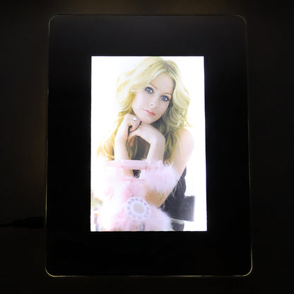 Wukusy multifunctional LED magic mirror with hidden photo frame, modern home improvement decor, reflective surface and photo display.