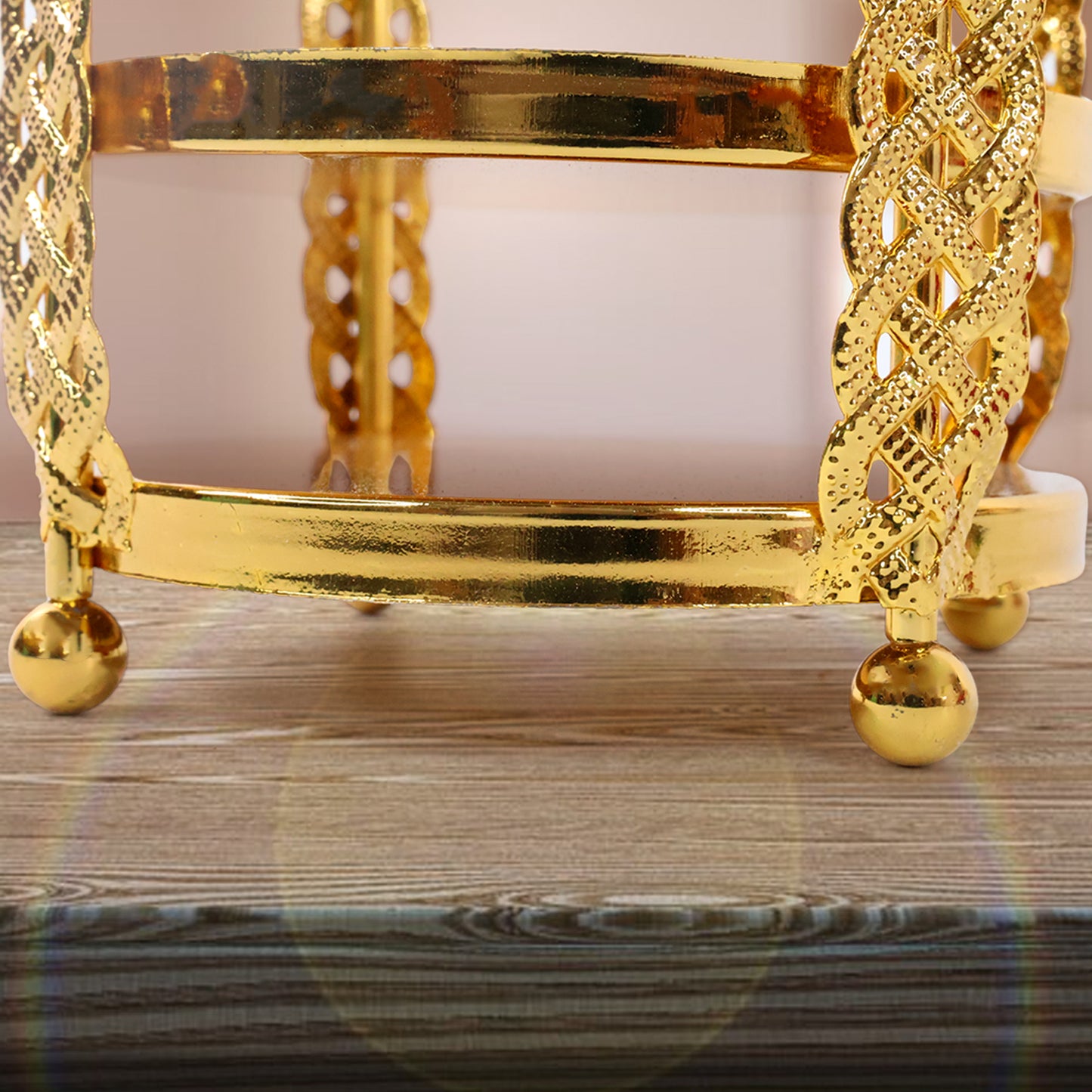 Golden metal candle stand showpiece by Wukusy, multipurpose home decor with elegant design for living spaces.